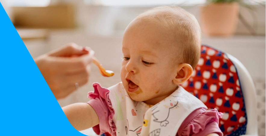 How can I encourage my baby to self-feed?